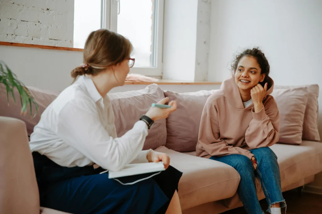 Patient smiling during a consultation with a licensed provider
